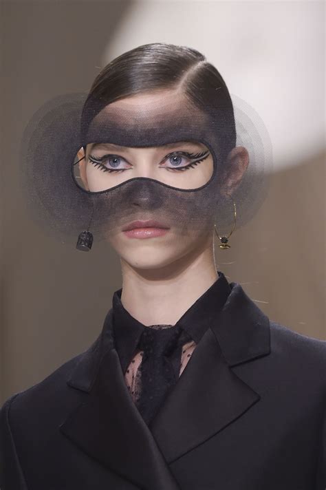 christian dior couture fashion wearing masks